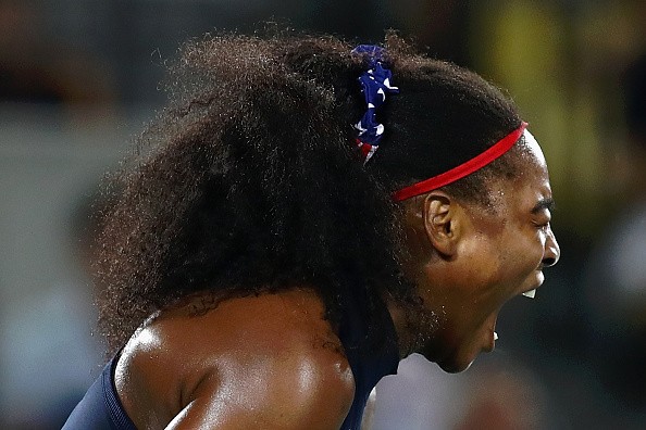 Serena Williams of the United States reacts during a Women's Singles Third Round match against Elina Svitolina of Ukraine on Day 4 of the Rio 2016 Olympic Games at the Olympic Tennis Centre on August 9, 2016 in Rio de Janeiro, Brazil.