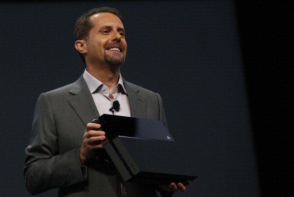 Andrew House, President and Group CEO Sony Computer Entertainment Inc., holds up a Playstation 4 at the Sony Playstation E3 2013 press conference.