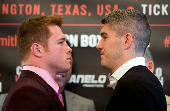 Canelo Alverez (L) and Liam Smith (R) square up during the Canelo Alvarez vs Liam Smith boxing press conference at The Landmark Hotel on July 20, 2016 in London, England.