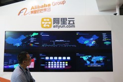 A visitor looks at Alibaba Cloud device exhibit during the 18th China Beijing International High-tech Expo held at China international Exhibition Center in Beijing last year.