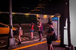  People play 'Pokemon Go' on their smartphones on Aug 7, 2016 in Taipei, Taiwan.  