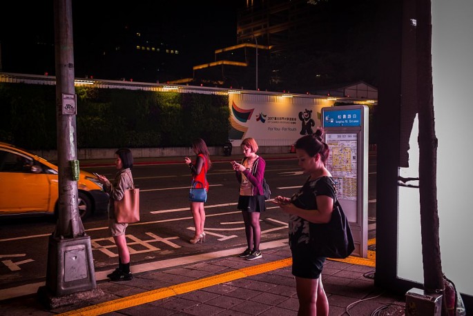  People play 'Pokemon Go' on their smartphones on Aug 7, 2016 in Taipei, Taiwan.  