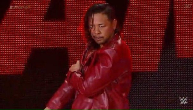 Shinsuke Nakamura looks determined during his entrance at an NXT event.
