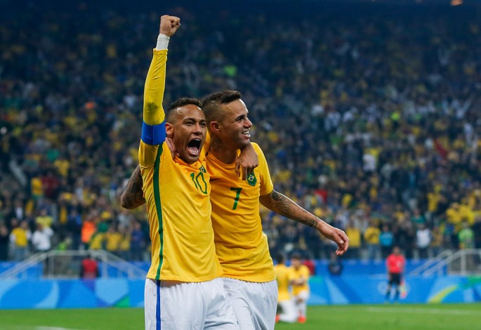 Brazil players Neymar (L) and Luan celebrate their quarterfinals win over Colombia in the 2016 Rio Olympics.