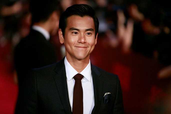 Eddie Peng poses for a picture on the red carpet at The 18th Shanghai International Film Festival on June 13, 2015 in Shanghai, China.