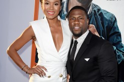 Actor Kevin Hart (R) and Eniko Parrish arrive at the premiere of Warner Bros. Pictures' 'Get Hard' at the Chinese Theatre on March 25, 2015 in Los Angeles, California.  