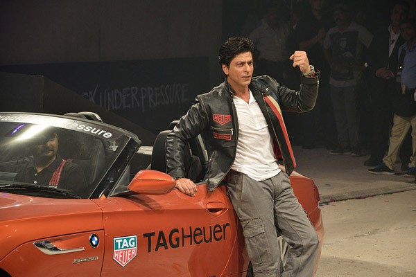 Bollywood actor Shah Rukh Khan, the brand ambassador for TAG Heuer watches, flashes the new Aquaracer 300m Automatic Chronograph on his wrist in Mumbai.