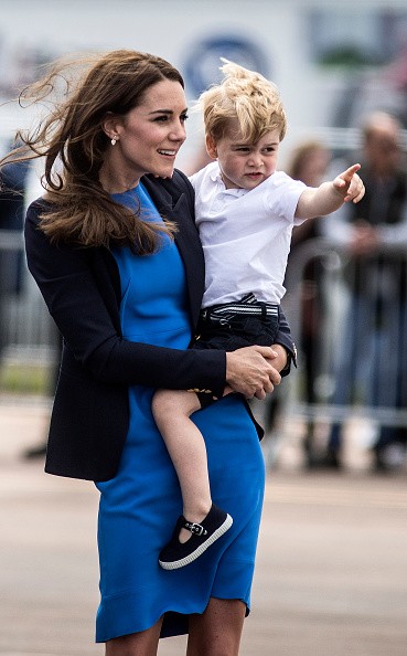 Catherine, Duchess of Cambridge and Prince George during a visit to the Royal International Air Tattoo at RAF Fairford on July 8, 2016 in Fairford, England.