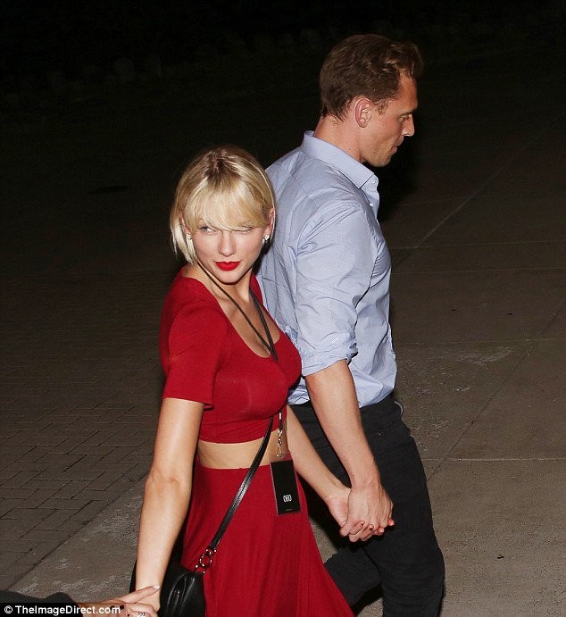 Taylor Swift and Tom Hiddleston are seen holding each other's hands after Selena Gomez's concert.