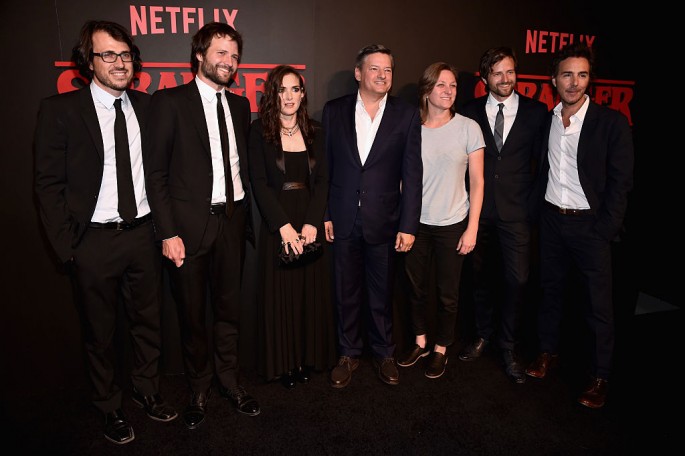 Dan Cohen, Ross Duffer, Winona Ryder, Ted Sarandos, Cindy Holland, Matt Duffer and Shawn Levy attend the Premiere of Netflix's 'Stranger Things' at Mack Sennett Studios on July 11, 2016 in Los Angeles, California.