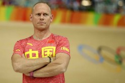 China's field cycling coach Benoit Vetu led the field cycling team to its first gold medal.