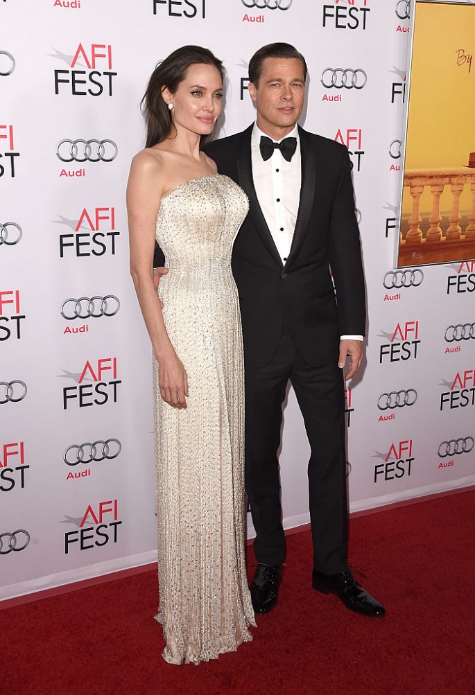 Brad Pitt and Angelina Jolie appear in public amid divorce rumors.