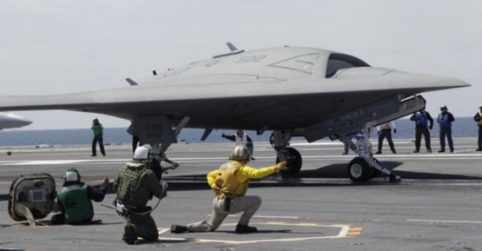 MQ-25 aboard a UN Navy aircraft carrier.
