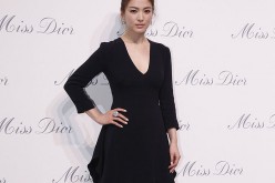 Song Hye Kyo poses for a picture at the 2014 Miss Dior Exhibition held in Shanghai, China.