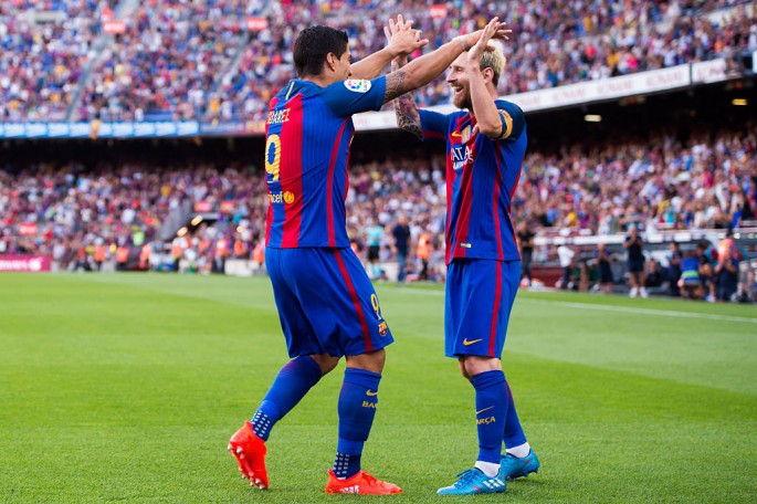 Barcelona forwards Luis Suárez (L) and Lionel Messi.