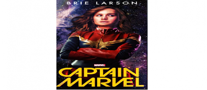 Brie Larson donning Captain Marvel's costume