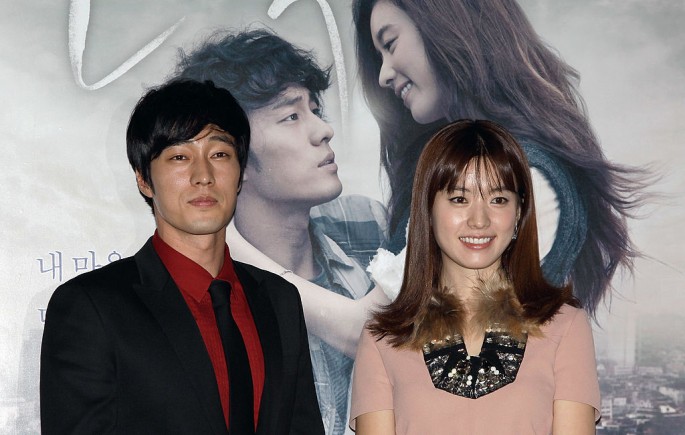Actress Han Hyo-Joo and actor So Ji-Sub attend a photocall for 'Always', the opening film of the 16th Busan International Film Festival (BIFF) during the press conference at the Busan Cinema Center on October 6, 2011 in Busan, South Korea.