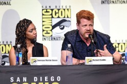 Actors Sonequa Martin-Green (L) and Michael Cudlitz attend AMC's 'The Walking Dead' panel during Comic-Con International 2016 at San Diego Convention Center on July 22, 2016 in San Diego, California. 