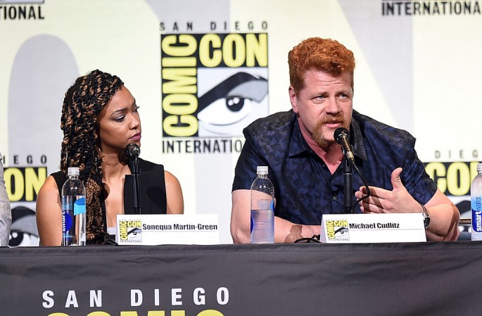 Actors Sonequa Martin-Green (L) and Michael Cudlitz attend AMC's 'The Walking Dead' panel during Comic-Con International 2016 at San Diego Convention Center on July 22, 2016 in San Diego, California. 