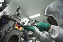 Chinese researcher at a research lab.
