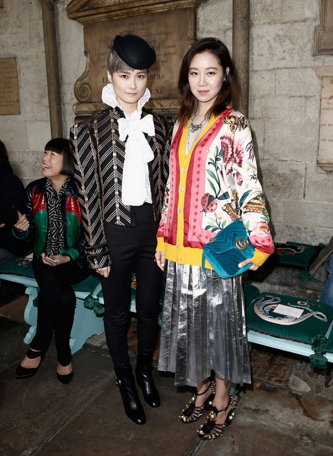 Chris Lee (L) and Kong Hyo Jin attend the Gucci Cruise 2017 fashion show at the Cloisters of Westminster Abbey on June 2, 2016 in London, England.