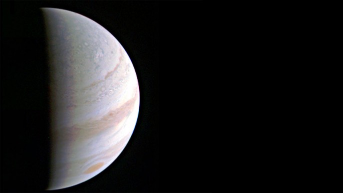 Jupiter's north polar region comes into view as NASA's Juno spacecraft approaches the giant planet. This view of Jupiter was taken on Aug. 27, when Juno was 703,000 kilometers away.