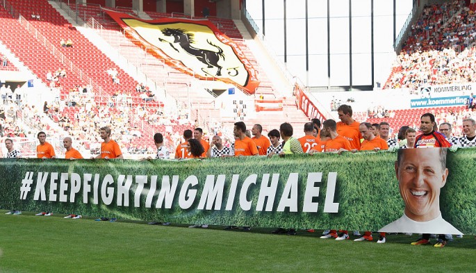 A long banner is displayed across the field during 'Champions For Charity' Football Match to honor the legendary racer, Michael Schumacher.