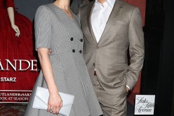 Caitriona Balfe and Sam Heughan attend 'Outlander' and Saks Fifth Avenue Photocall at Saks Fifth Avenue on April 7, 2016 in New York City.