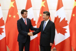 Chinese President Xi Jinping urged enhanced cooperation between Beijing and Ottawa in a meeting with Canadian Prime Minister Justin Trudeau.
