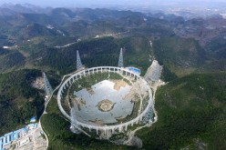 The Five-Hundred-Meter Aperture Spherical Radio Telescope (FAST) undergoes testing on Nov. 26, 2015 in Pingtang County, China.