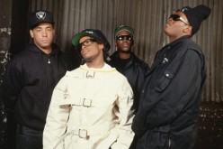 Heller guided N.W.A. — which included DJ Yella, MC Ren, Eazy-E (center, wearing straitjacket), and Dr. Dre (right, wearing ski cap) — to success.