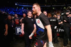 Josh Barnett of the United States leaves the Octagon after losing by submission to Ben Rothwell of the United States (not pictured) in the second round of their heavyweight bout during the UFC Fight Night event at the Prudential Center on January 30, 2016