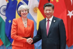 Chinese President Xi Jinping (right) shakes hands with British Prime Minister Theresa May during the G20 Summit on Sept. 4, 2016 in Hangzhou, China.