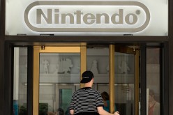 A man enters Nintendo's flagship store, July 11, 2016 in New York City. Nintendo NX console is rumored to be announced in October