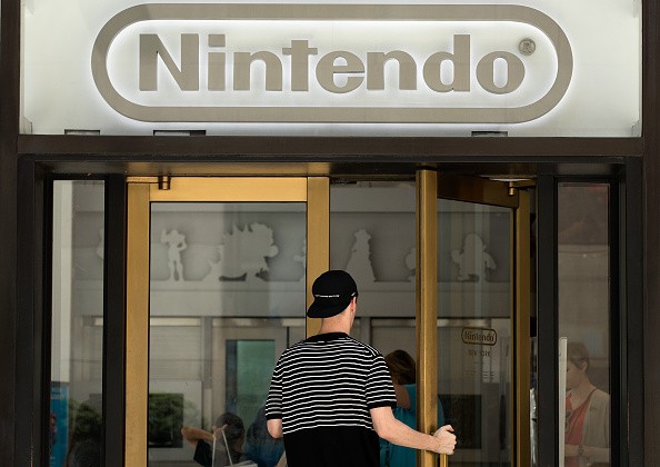 A man enters Nintendo's flagship store, July 11, 2016 in New York City. Nintendo NX console is rumored to be announced in October