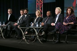 (L-R) Executive Producer Rob Thomas, actors Robert Buckley, Rahul Kohli, Rose McIver, Malcolm Goodwin and David Anders and executive producer Diane Ruggiero-Wright listen onstage to a question from the media audience during the 'iZombie' panel in 2015.  