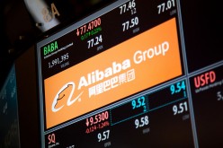 Alibaba Group Holding Ltd.'s stock performance is displayed on a monitor on the floor of the New York Stock Exchange (NYSE) in New York.