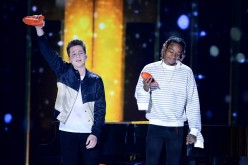 Recording artists Charlie Puth (L) and Wiz Khalifa, winners of the Favorite Collaboration award for 'See You Again,' perform onstage during Nickelodeon's 2016 Kids' Choice Awards at The Forum on March 12, 2016 in Inglewood, California.  