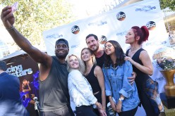  Dancers Keo Motsepe, Witney Carson, Lindsay Arnold, Valentin Chmerkovskiy and Sharna Burgess pose with a fan at The Grove Hosts Dancing With The Stars Dance Lab With pros Val Chmerkovskiy, Whitney Carson and Sharna Burgess at The Grove on August 17, 2016