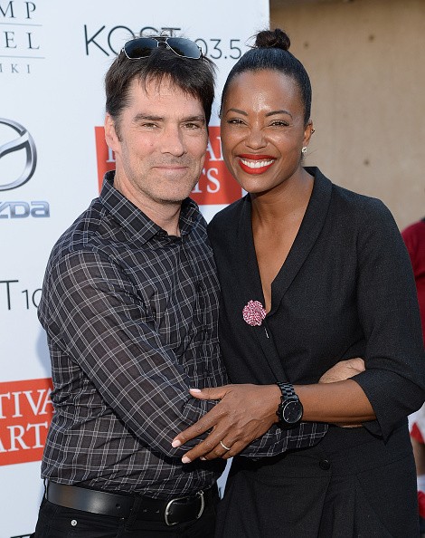 Actors Thomas Gibson  and Aisha Tyler attend the 2015 Festival Of Arts Celebrity Benefit Concert And Pageant on August 29, 2015 in Laguna Beach, California. 