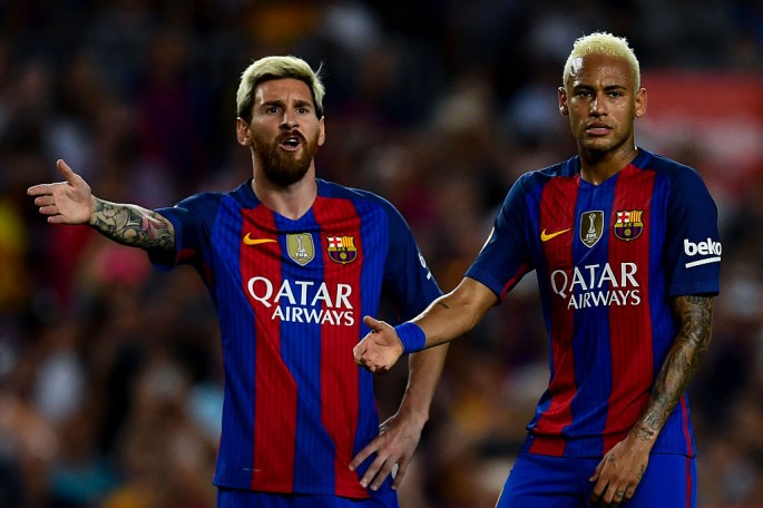 FC Barcelona players Lionel Messi (L) and Neymar.
