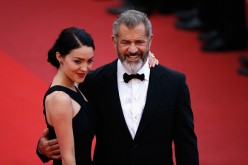 Mel Gibson (R) and Rosalind Ross attend the closing ceremony of the 69th annual Cannes Film Festival at the Palais des Festivals on May 22, 2016 in Cannes, France. 