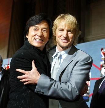 Actors Owen Wilson and Jackie Chan posed for photos at the premiere of "Shanghai Knights" at the El Capitan Theatre on Feb. 3, 2003 in Los Angeles, California.