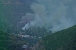 Smoke rises from Indian Army camp at Uri attacked by Kashmiri Muslim militants.