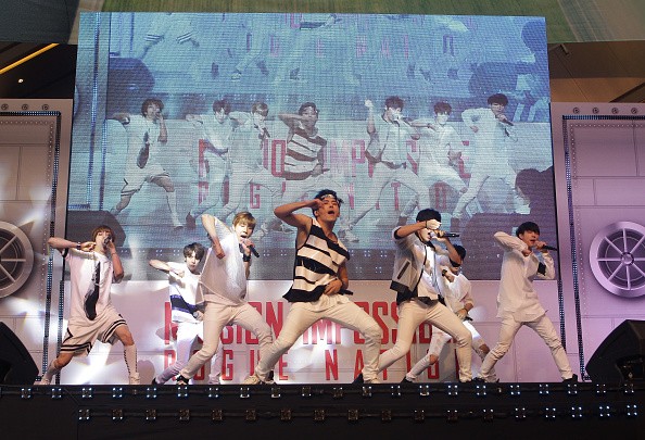South Korean boy band INFINITE perform on stage during the Korea Premiere of 'Mission: Impossible - Rogue Nation' at the Lotte World Tower Mall at on July 30, 2015 in Seoul, South Korea.