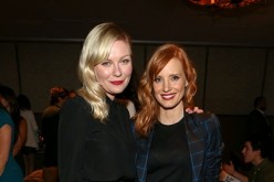 Kirsten Dunst and Jessica Chastain attend cinema prive And PANDORA Jewelry Host A Special Screening Of 'A Most Violent Year' at cinema prive on November 16, 2014 in West Hollywood, California. 