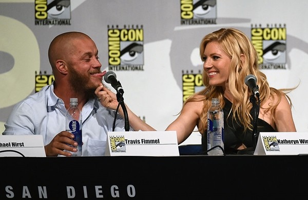 Katheryn Winnick pulls on actor Travis Fimmel's beard as they joke around during a panel for the History series 'Vikings' during Comic-Con International 2015 at the San Diego Convention Center on July 10, 2015 in San Diego, California.