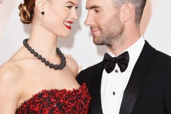 Singer Adam Levine (L) and model Behati Prinsloo attend the 87th Annual Academy Awards at Hollywood & Highland Center on February 22, 2015 in Hollywood, California.