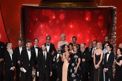 Writer/producers David Benioff and D.B. Weiss (both center-left, at microphone) with production crew accept Outstanding Drama Series for 'Game of Thrones' onstage during the 68th Annual Primetime Emmy Awards at Microsoft Theater on September 18, 2016 in L
