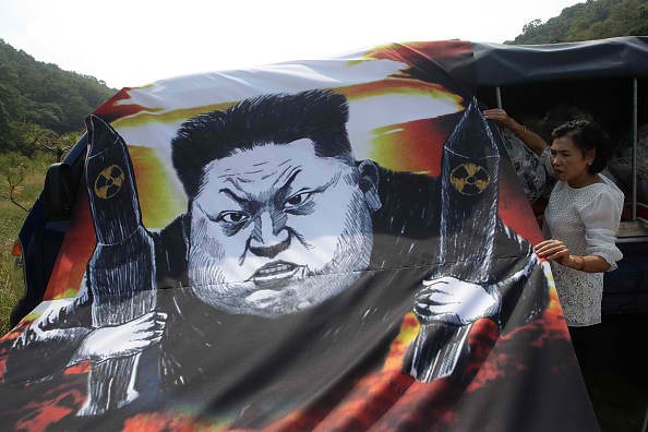 Defectors protest North Korea's nuclear arms program.